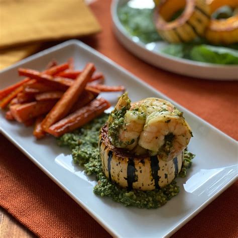 roasted-delicata-squash-stuffed-with-shrimp-baby-kale image