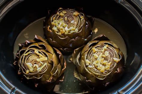 slow-cooker-garlic-lemon-butter-artichokes image