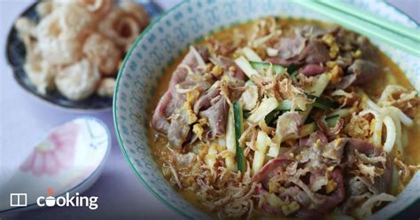 satay-soup-with-poached-beef-and-udon-noodles image