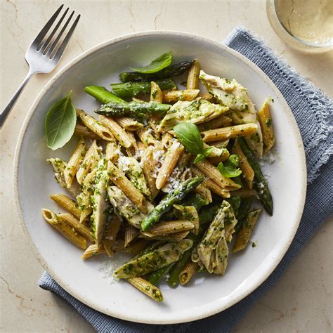 chicken-pesto-pasta-with-asparagus-recipe-eatingwell image