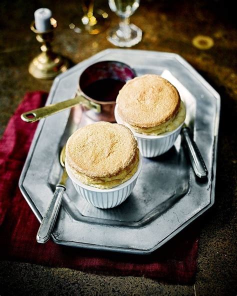 vanilla-and-ginger-souffls-with-blackberry-gin-sauce image