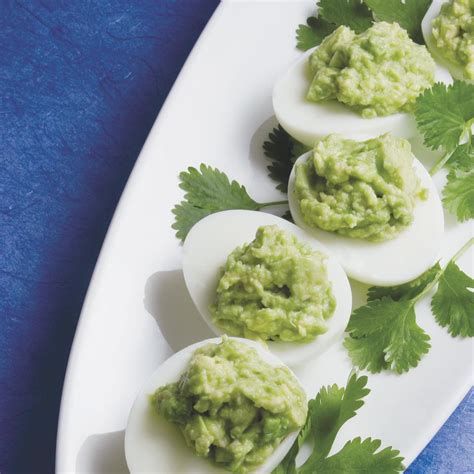 guacamole-stuffed-eggs-eatingwell image