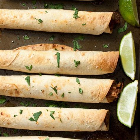 baked-bbq-pulled-pork-taquitos-smells-like-home image
