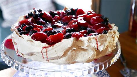 spiced-pavlova-with-plums-and-cherries-recipe-bbc-food image