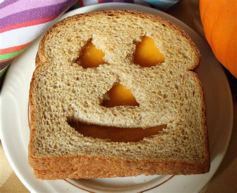 jack-o-lantern-grilled-cheese-for-healthy-halloween image