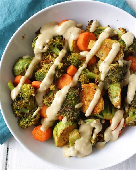 easy-roasted-veggies-with-zesty-hummus-dressing image