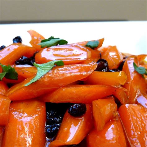 honey-tangerine-glazed-carrots-with-currants-food52 image