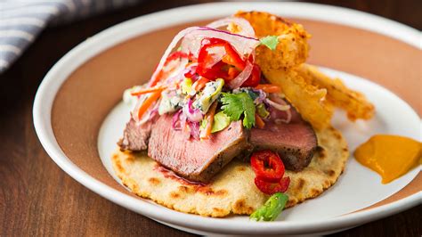 beef-tenderloin-tacos-with-blue-cheese-slaw-and-crispy image
