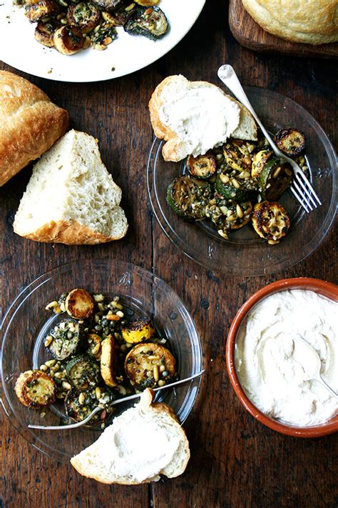 sauted-zucchini-with-basil-mint-pine-nuts image