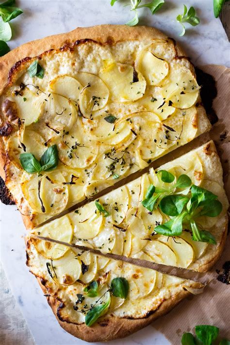cheesy-potato-pizza-with-thyme-inside-the-rustic image