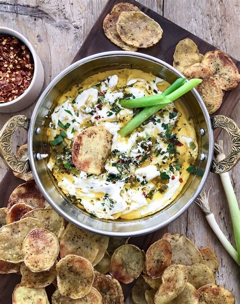 labneh-with-chilli-sizzled-scallions-and-baked-potato-chips image