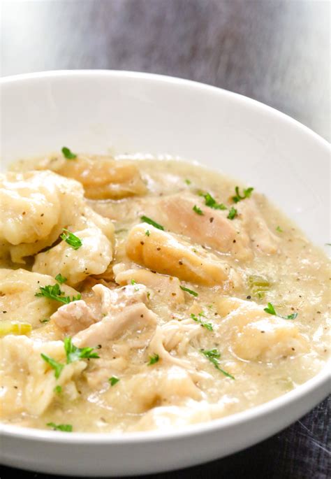 easy-crockpot-chicken-and-dumplings-with-biscuits image