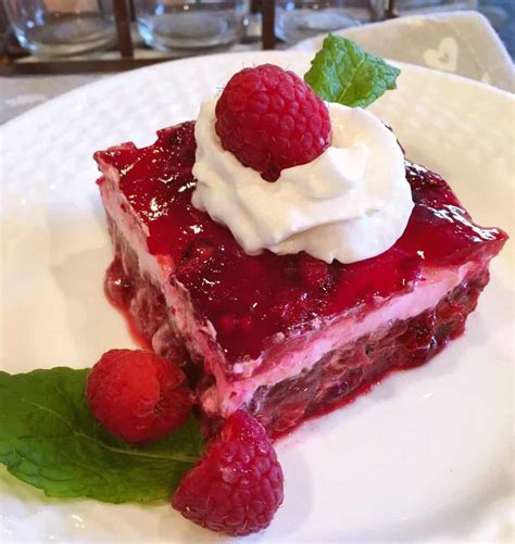 raspberry-layered-jello-salad-norines-nest image