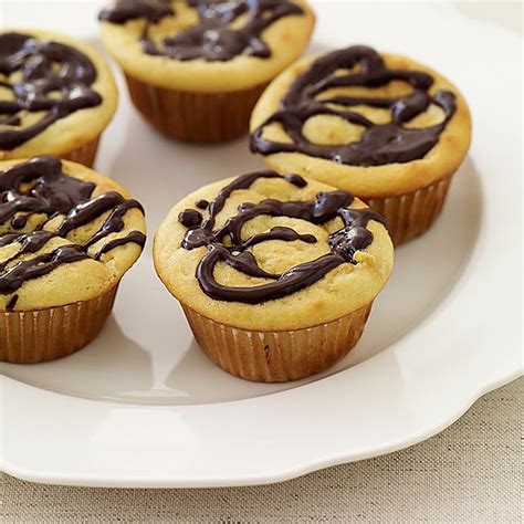 vanilla-cupcakes-drizzled-with-chocolate-recipes-ww-usa image