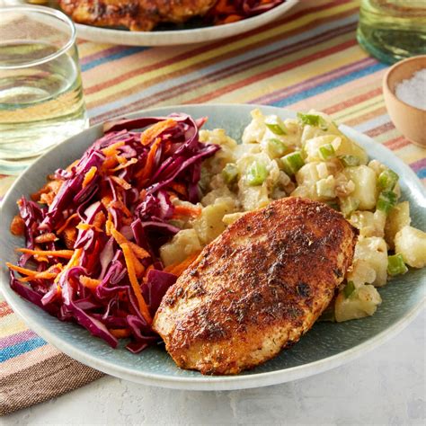 cajun-spiced-chicken-with-potato-salad-red image