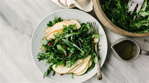 arugula-pear-salad-with-pistachios-and-pomegranate image
