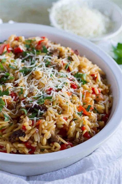 orzo-recipe-with-italian-sausage-and-peppers-taste image