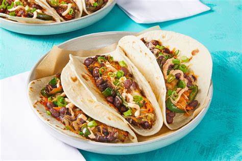 cheesy-black-bean-tacos-recipe-hellofresh image