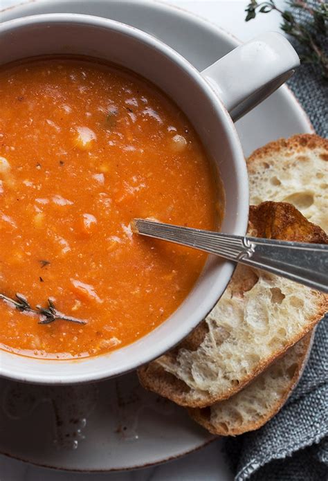 instant-pot-bean-with-bacon-soup-seasons-and-suppers image