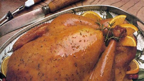 roast-turkey-with-orange-rosemary-butter-and-pan-gravy image