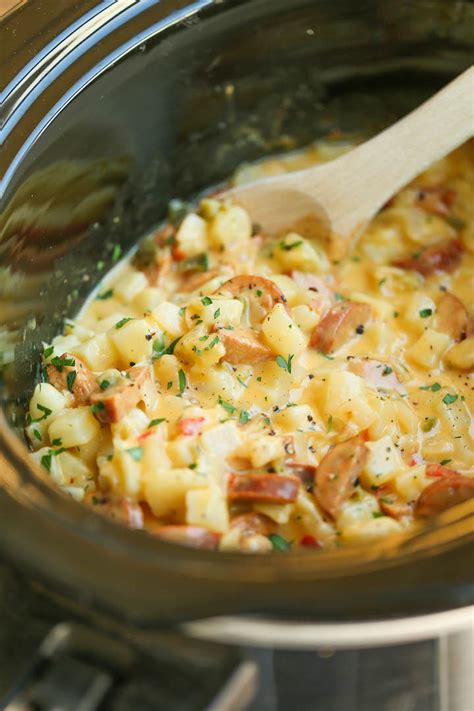 slow-cooker-cheesy-breakfast-potatoes-damn-delicious image