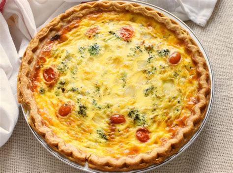 easy-quiche-recipe-with-tomatoes-cheese-sizzling image
