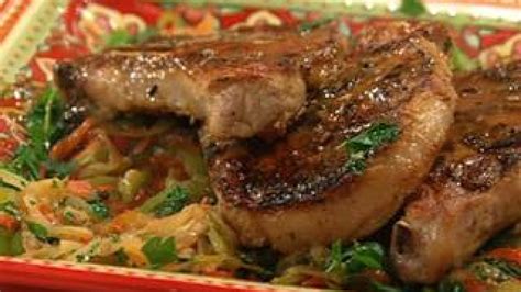 pork-chops-with-peppers-and-onions-rachael-ray-show image