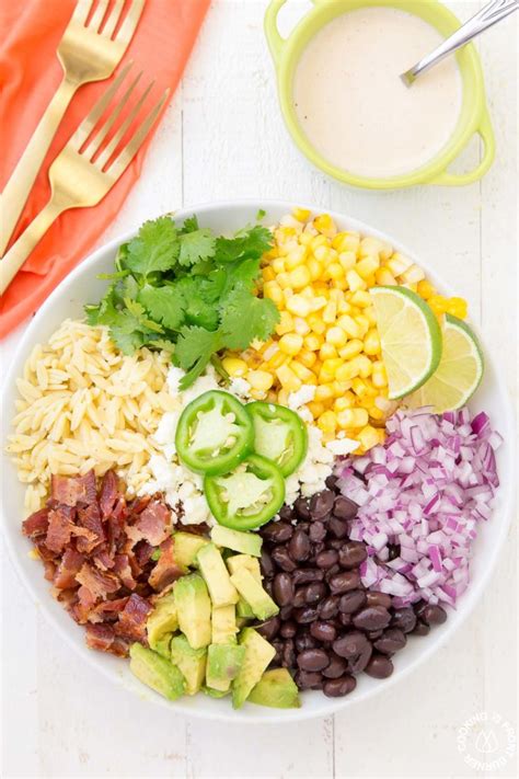 mexican-street-corn-orzo-salad-cooking-on-the-front image