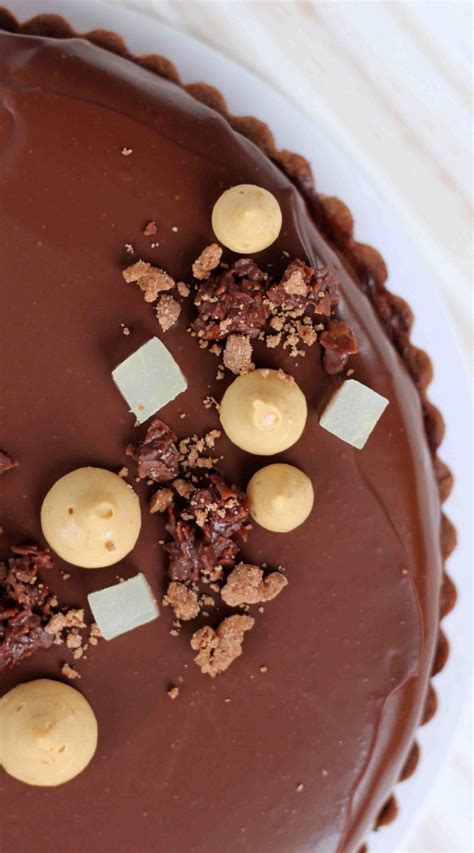 salted-caramel-pear-and-pecan-chocolate-tart-butter image
