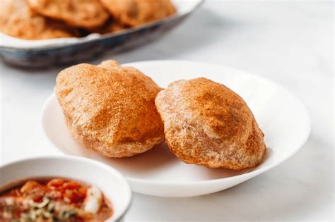 how-to-make-poori-fried-indian-flatbread image