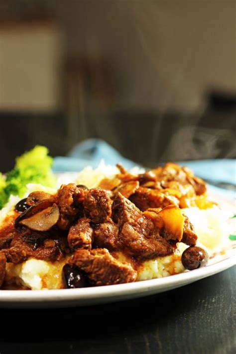 mushroom-beef-stew-with-kalamata-olives-good-cheap image