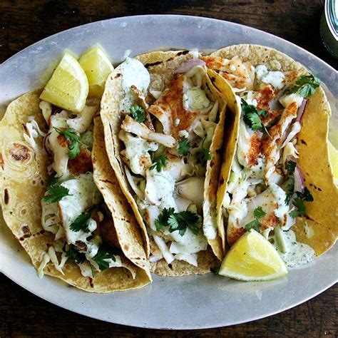 skillet-grilled-fish-tacos-with-cilantro-lime-crema image