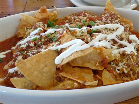 chilaquiles-recipe-mexican-fried-tortillas-in-sauce-whats4eats image