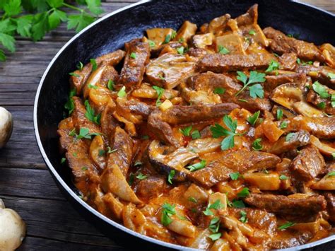 veal-stew-with-sour-cream-and-mushrooms image