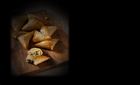 balderson-cheese-spinach-and-cheddar-phyllo-triangles image