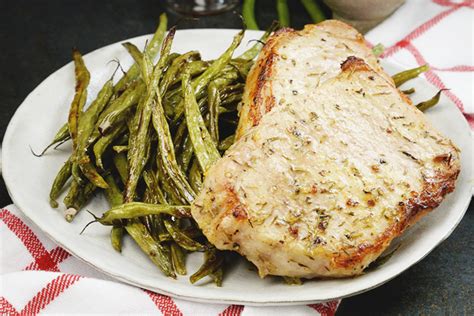 sheet-pan-pork-chops-recipe-with-green-beans image