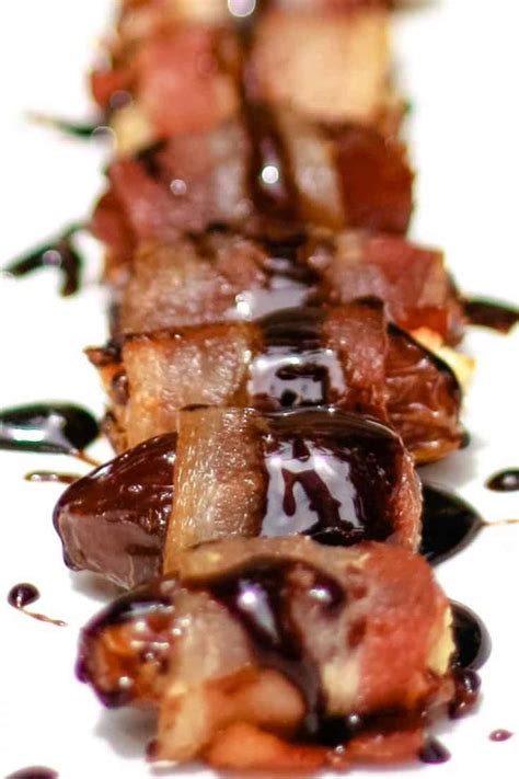bacon-wrapped-dates-with-a-honey-balsamic-reduction image