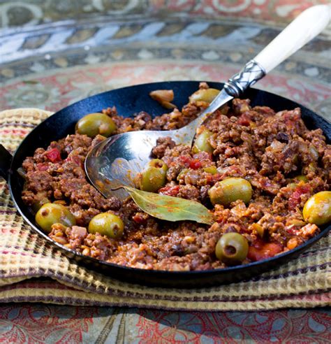 cuban-picadillo-ground-beef-stew-with-tomato-sauce image