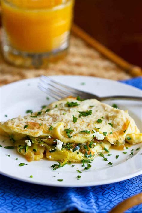 veggie-omelette-with-zucchini-caramelized-onions-healthy image