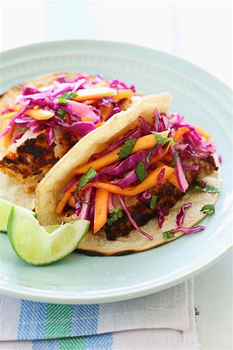blackened-fish-tacos-with-cabbage-mango-slaw-skinnytaste image