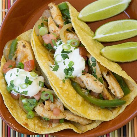 spicy-chicken-tacos-recipe-eatingwell image
