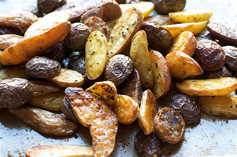 rosemary-garlic-roasted-fingerling-potatoes-spoon image