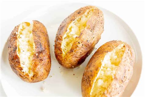 the-easiest-grilled-baked-potatoes-in-foil-julie-blanner image