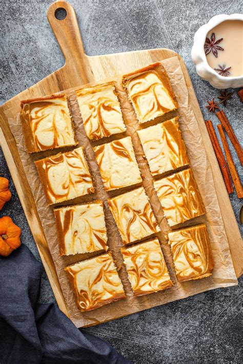 easy-swirled-pumpkin-cheesecake-bars-the-novice-chef image