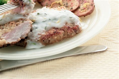 baked-pork-chops-with-lemon-and-herbs-canadian image