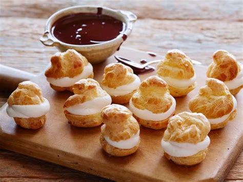 cream-filled-profiteroles-with-chocolate-sauce image