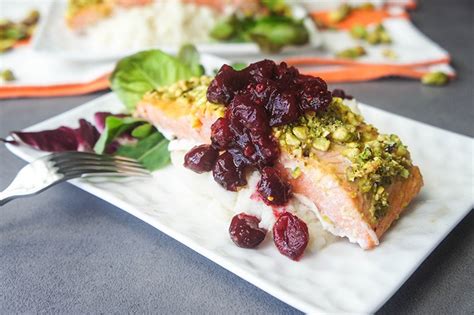 pistachio-salmon-with-cranberry-sauce-and-celriac-mash image