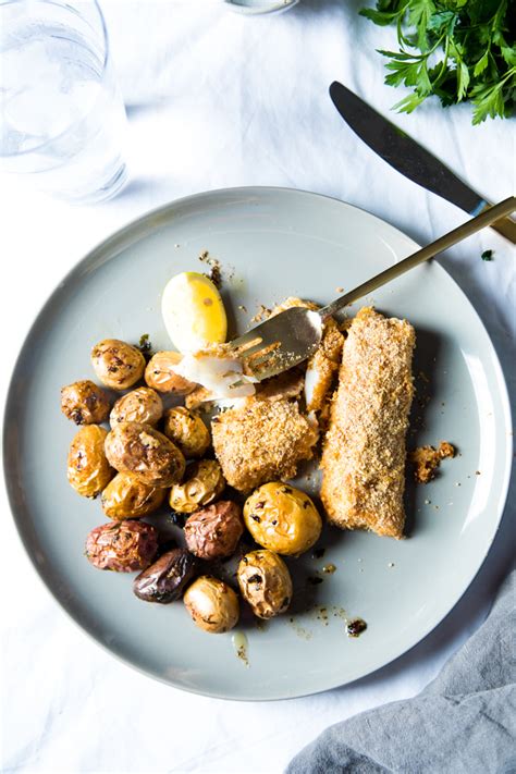 parmesan-crusted-pollock-with-garlic-roasted-potatoes image
