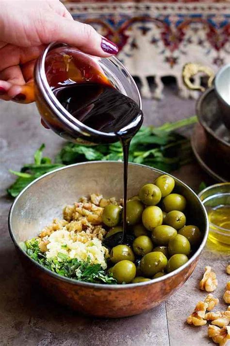 marinated-olives-with-walnuts-zeytoon-parvardeh image
