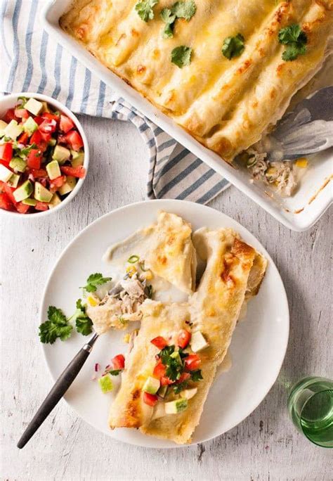 creamy-white-chicken-enchiladas-recipetin-eats image